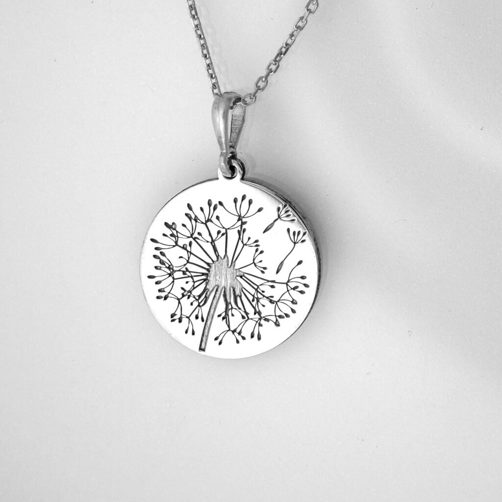 Featuring stunning craftsmanship, this pendant resonates with positivity and hope. The dandelion itself serves as a timeless symbol of wishes, capturing the essence of longing and aspirations. Wearing this pendant allows you to keep your dreams close to your heart.