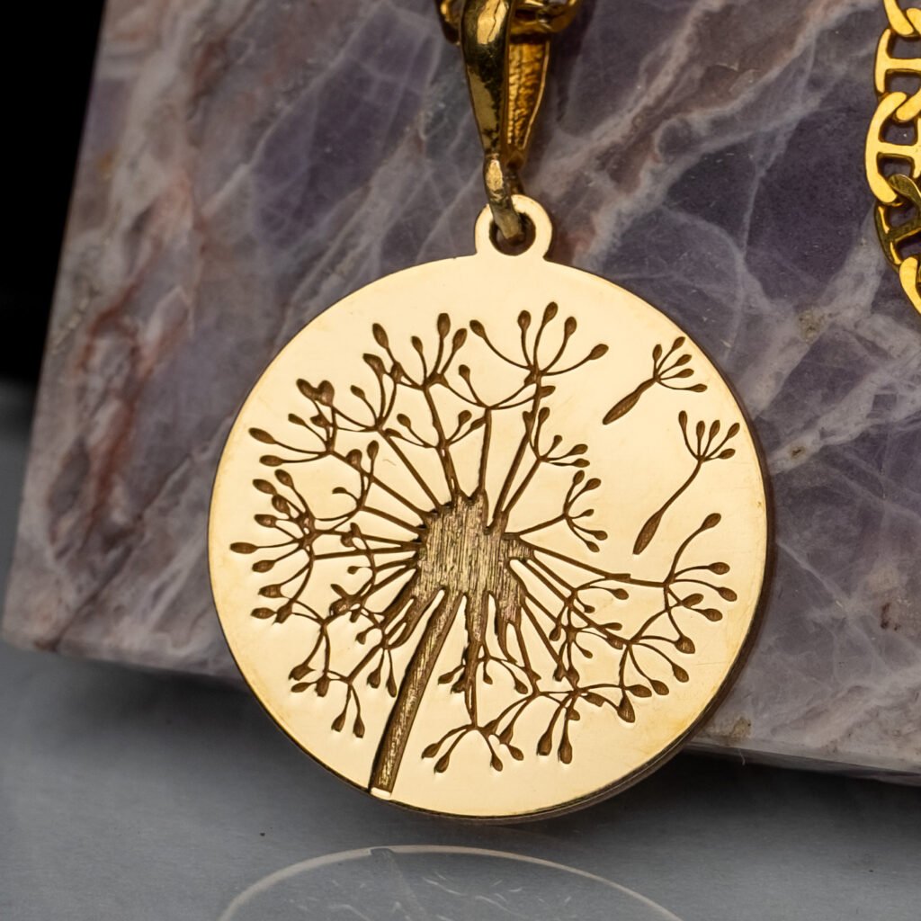 Symbol of Freedom Carry the elegance of nature with our delicate dandelion pendant. This beautiful piece is crafted to embody both the charm of the dandelion and the profound symbolism behind it. Dandelions are often viewed as a representation of freedom, reminding you to embrace the beauty of life's moments.